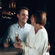 A couple enjoying time together in the bar aboard Aurora Botnia