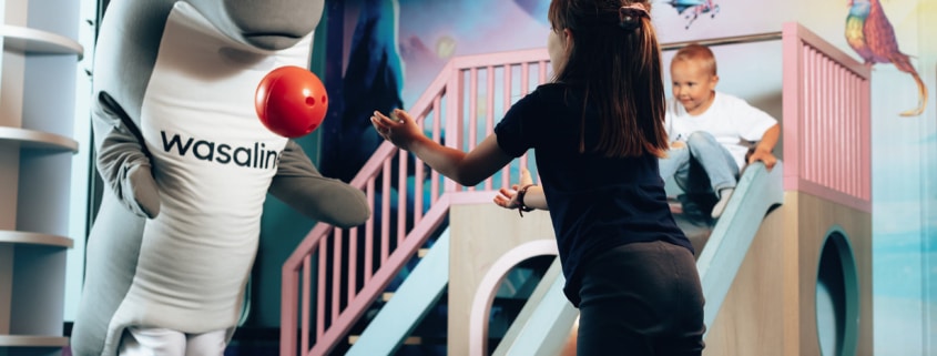 Wenni playing ball with the children