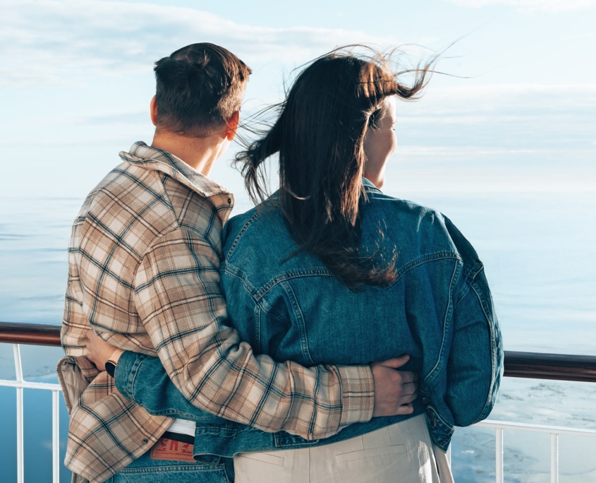 Couple enjoying the sea view aboard Aurora Botnia