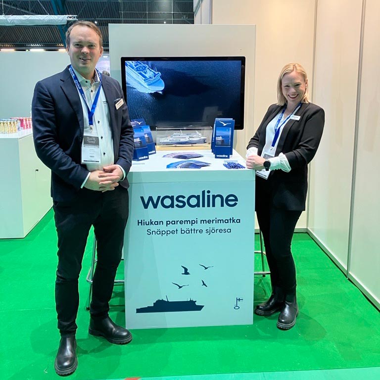 Wasaline staff at a trade fair booth