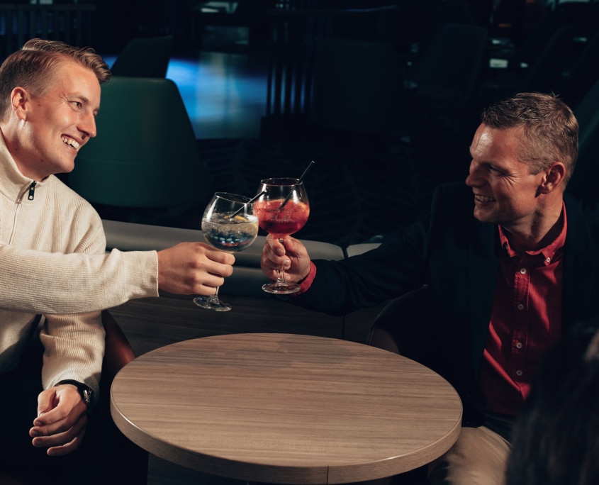 Passengers enjoying a round of drinks at Aurora Botnia bar