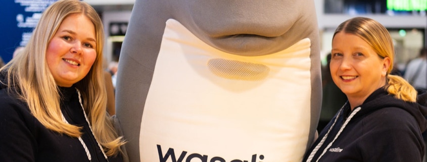 Wasaline staff and Wenni the mascot at Matkamessut trade fair