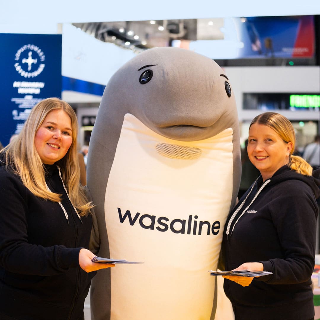 Wasaline staff and Wenni the mascot at Matkamessut trade fair