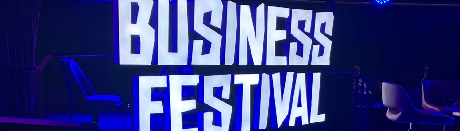Business Festival logo on stage