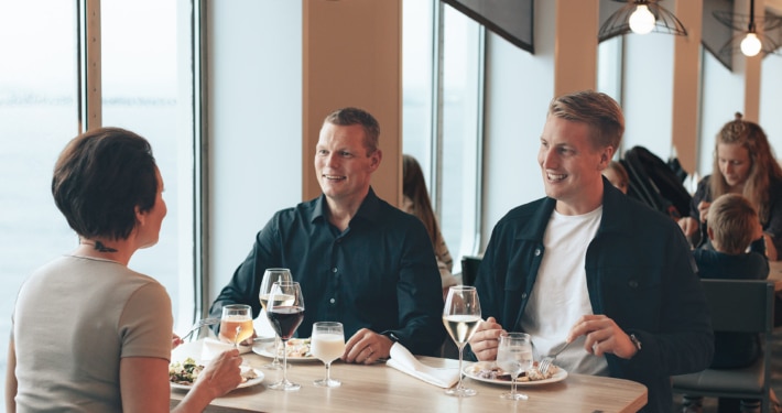 Group of conference guests enjoying lunch at Archipelago Buffet